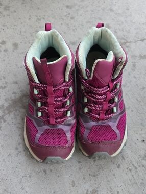 Merrell Moab FST Mid hiking boots in a vibrant purple color 3M